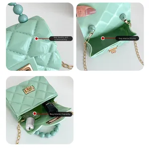 Detail view of mint green jelly bag showing quilted texture and interior storage capacity