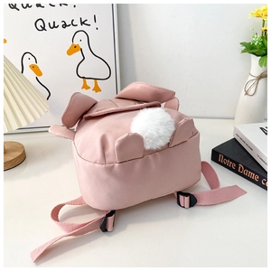Detailed back view of pink bunny backpack with plush tail and adjustable straps