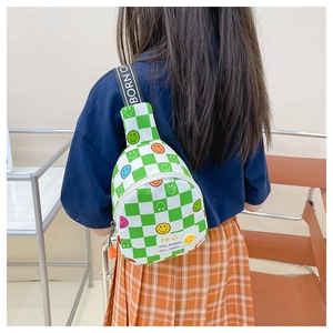 Green checkerboard kids crossbody bag with smiley face patterns and lettered strap