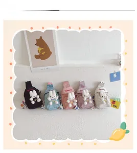 Detailed display of five colorful canvas bunny chest bags for kids with 3D plush rabbit