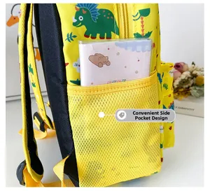 Detail of yellow mesh side pocket on cartoon dinosaur backpack with breathable padding