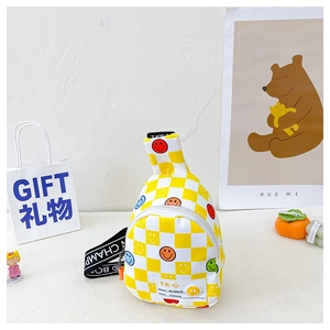 Detail of yellow checkerboard kids chest bag with colorful smiley faces and printed strap