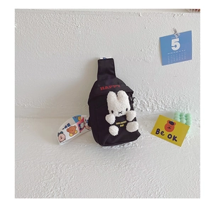 Detail of cute plush bunny on black canvas kids chest bag with colorful bear strap