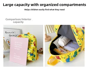 Detail of yellow kids dinosaur backpack showing internal storage and side mesh pocket