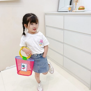 Girl's white Daisy Duck tee, denim skirt, and pink mesh beach tote with yellow handles