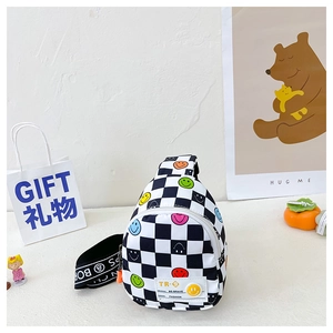 Detail of checkered kids chest bag with colorful smiley patterns and adjustable strap