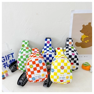 Detailed view of colorful checkerboard kids chest bags with smiley face patterns