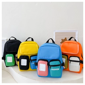Detailed view of lightweight canvas kids backpacks in black, yellow, blue, and orange colors
