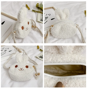 Detail view of white plush bunny crossbody bag with soft faux wool and gold bead strap