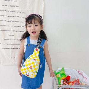 Kids yellow checkerboard crossbody bag with colorful smile patterns and canvas strap