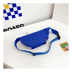 Detail of blue shark kids crossbody bag with adjustable strap and buckle closure