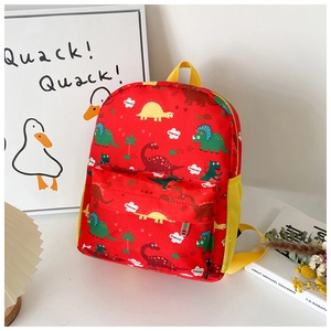 Macro shot of red dinosaur pattern kids backpack with vibrant yellow straps and details