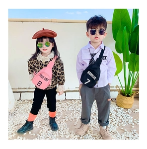 Detailed close-up of nylon cartoon crossbody chest bags with sports print for kids