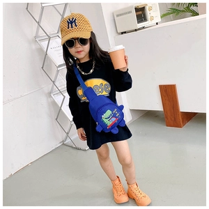 Détail du sac bandoulière dinosaure bleu pour enfants avec imprimé dessin animé nylon