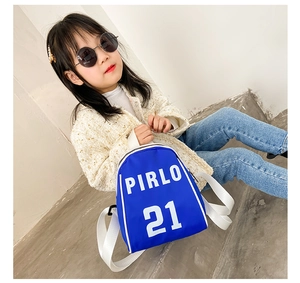 Detailed view of kids stylish blue shell backpack with white Pirlo 21 letter print