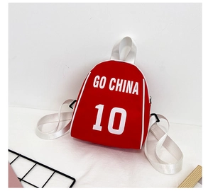 Detailed close-up of a red kids' canvas backpack featuring white GO CHINA 10 printing