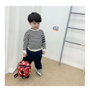 Sac à dos rouge pour enfants avec silhouettes de dinosaures blancs en toile robuste