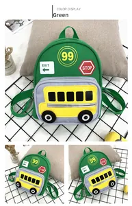 Detail view of green kids backpack with yellow school bus pocket and cute traffic icons