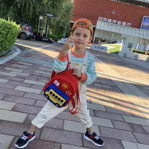 Toddler red school backpack with cartoon blue school bus pocket for outdoor school use