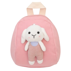 Pink canvas kids backpack with cute stuffed bunny doll for nursery and preschool