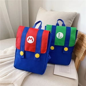 Detail of canvas backpacks with letter patches and vibrant color blocking for kids