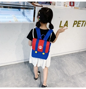Detailed back view of a kids' red and blue backpack with a white 'M' letter logo