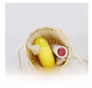 Internal view of mini woven crossbody bag showing storage capacity with daily items