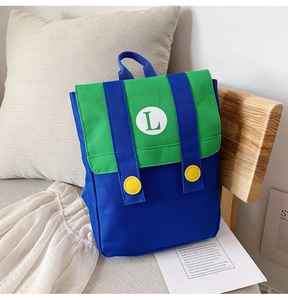Close-up of contrast color canvas kids backpack with green L logo and yellow buckles