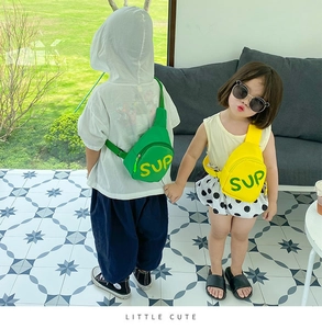 Kids colorful canvas crossbody bags in green and yellow with adjustable straps