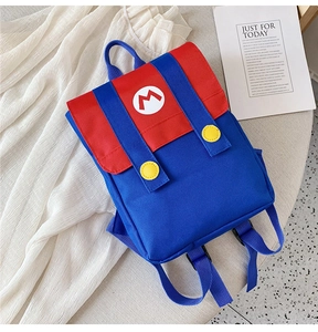 Detail of Mario-style kids backpack featuring red-blue contrast and iconic M logo patch