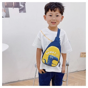 Detail of kids dinosaur cross body bag with blue and yellow contrast colors and strap