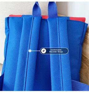 Detail of comfortable wide shoulder straps on kids backpack with durable canvas texture