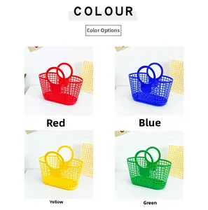 Detailed view of plastic hollow baskets in four vibrant colors for kids beach fun