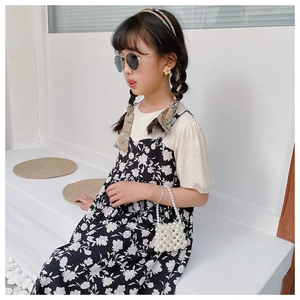 Kids pearl bead mini bag paired with a summer floral dress for a stylish toddler outfit