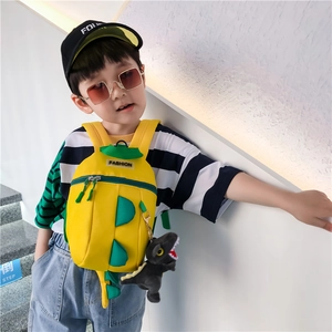 Sac de poitrine dinosaure jaune pour enfant avec piques vertes et porte-clé peluche