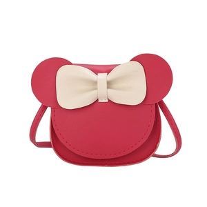 Cute red children's crossbody bag with round ears and a cream leather bow detail