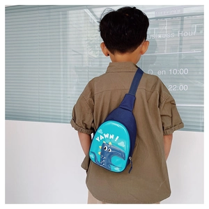 Detail of cute dinosaur egg hard shell chest bag with blue strap for kids