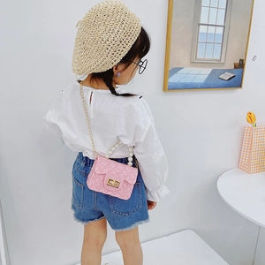 Girls pink jelly handbag with pearl handle and metal chain strap for kids