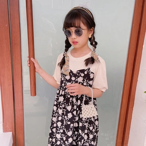 Girl's summer floral dress set with pearl handbag and stylish sunglasses accessory