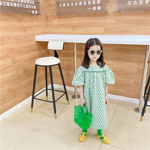 Detail of girl's green hollow plastic beach basket bag for summer travel fashion