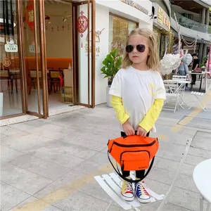 Vibrant orange nylon kids chest bag with adjustable strap for outdoor travel and sports