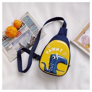 Detail of cute yellow dinosaur egg crossbody bag with adjustable strap for kids
