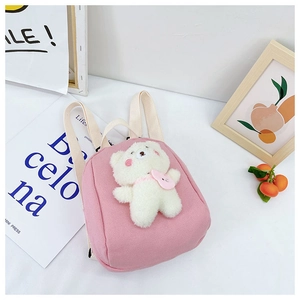 Pink canvas toddler backpack with a cute white plush bear on a clean white background