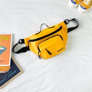 Bright yellow nylon crossbody waist bag for kids with adjustable black strap and zippers