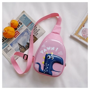 Close-up of pink dinosaur egg-shell crossbody bag with YAWN character and zip closure