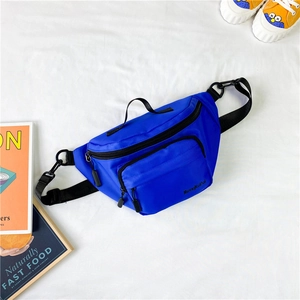 Bright blue kids nylon chest bag with adjustable strap and waterproof fabric