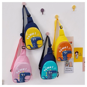 Detailed display of dinosaur egg-shaped cross-body bags in four bright color combinations