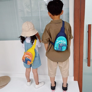 Cute dinosaur eggshell crossbody bags for kids in yellow and navy with cartoon prints