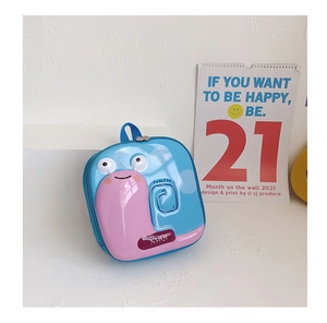 Detail view of a cute snail-shaped shell backpack for kids in blue and pink finish