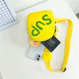 Bright yellow canvas crossbody bag for kids featuring a green SUP print on the front